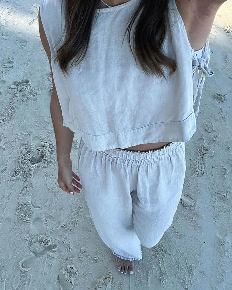 JO | Two-piece set consisting of vest and trousers with lacing
