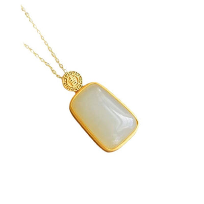 Delicate Artisan Gold Pendant