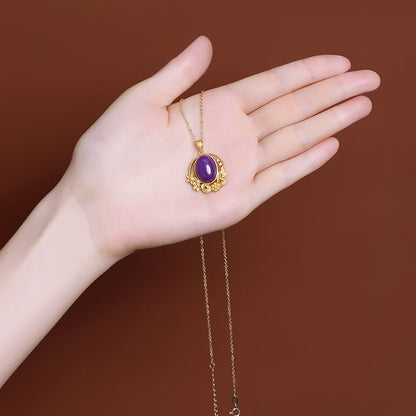 Delicate Artisan Gold Pendant