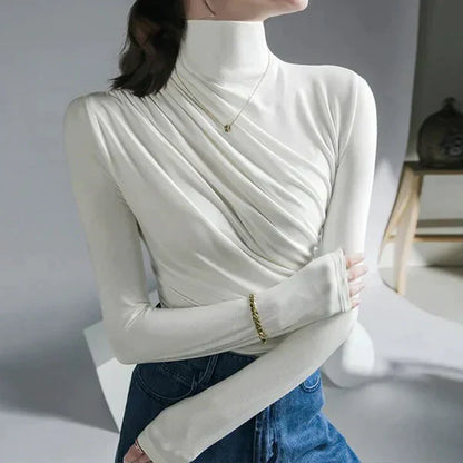 JO | Turtleneck sweater with pleats